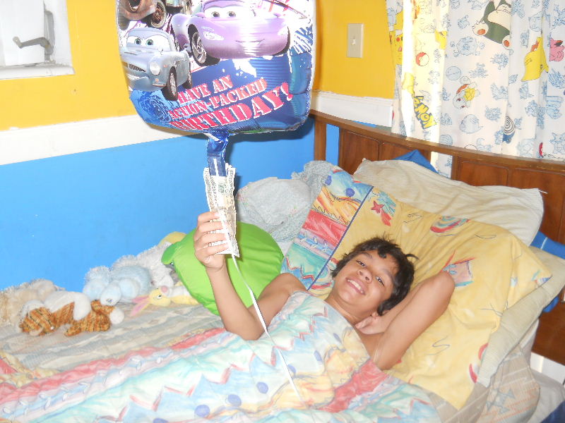 His balloon present. My boy loves cash!